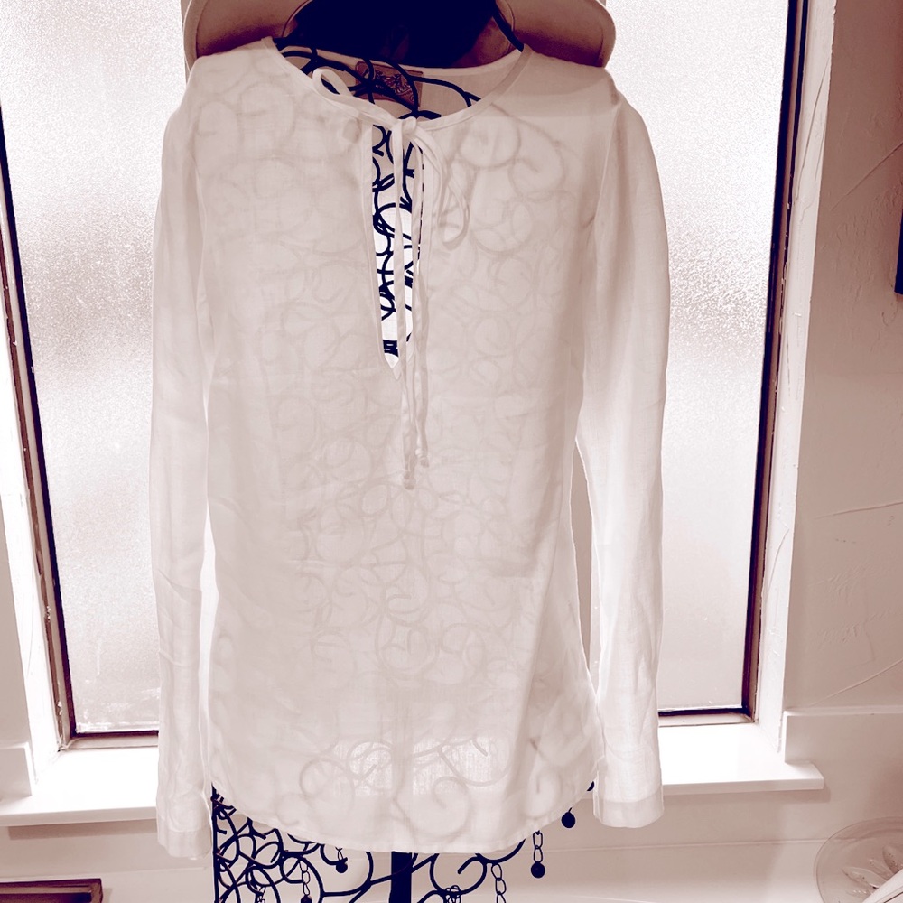 Juicy summer top. Ruched back for perfect fit.